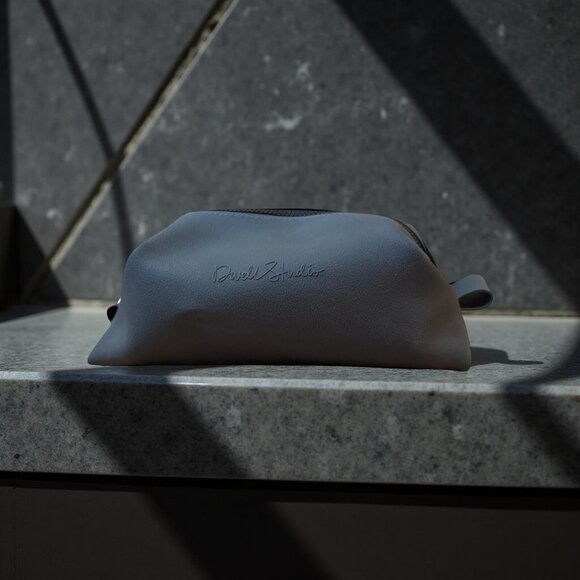 Dwell Studio Dark Gray Toiletry Bag 9" Leather-Like Finish With Zipper Closure - Picture 1 of 5